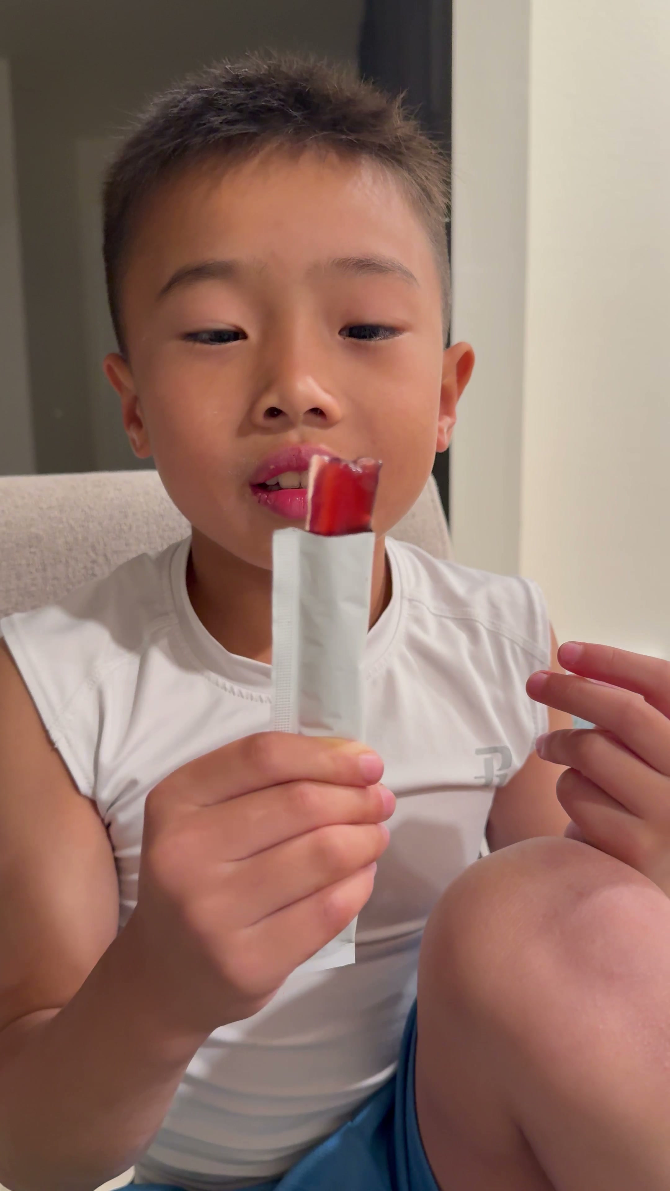 Kid eating MOER JellySTIX