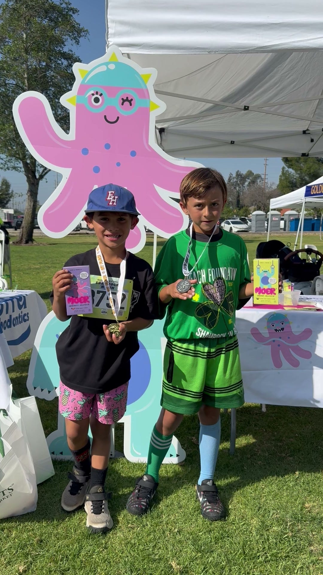 Young athletes holding MOER at an event