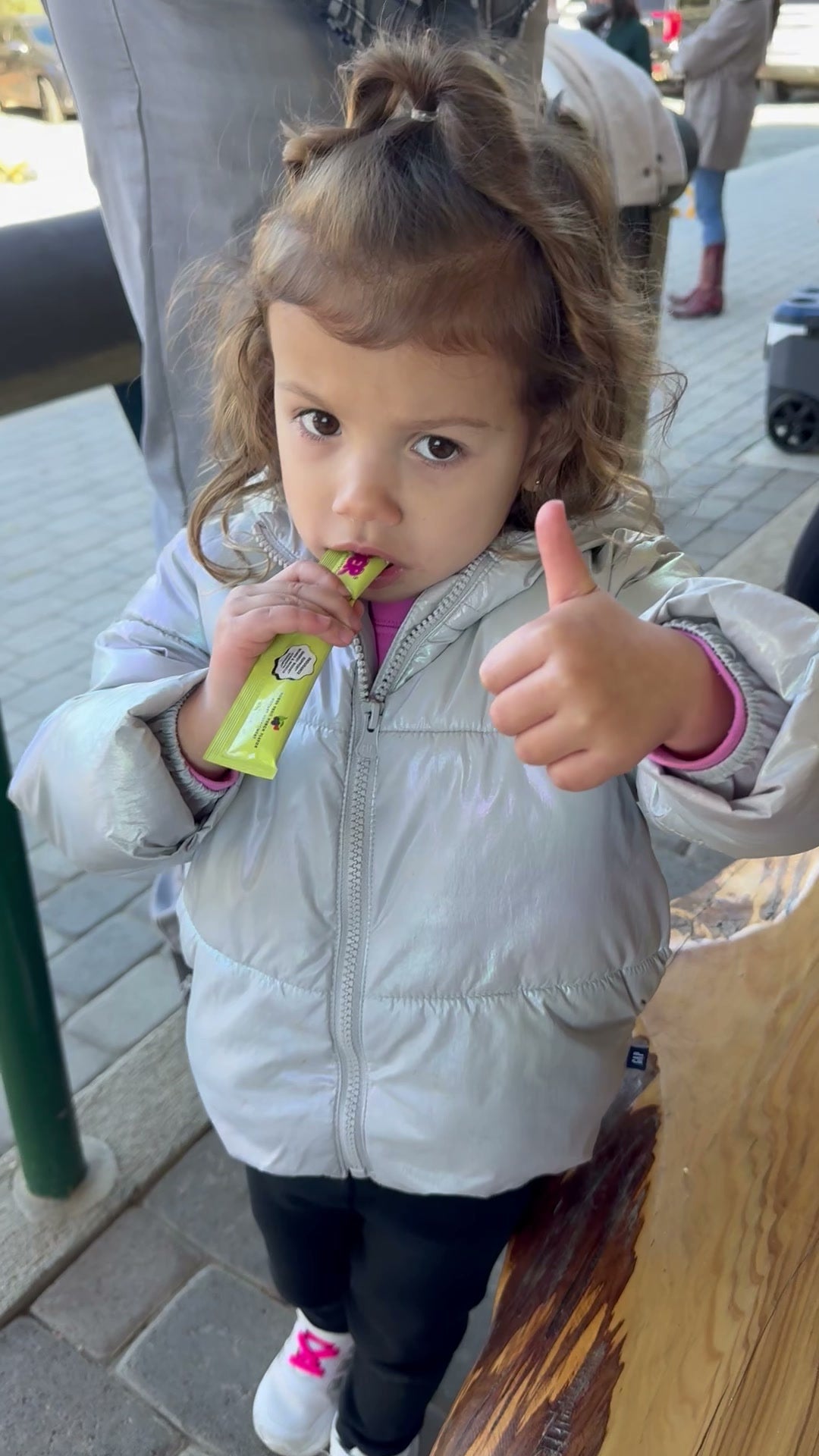 Kid giving thumbs up